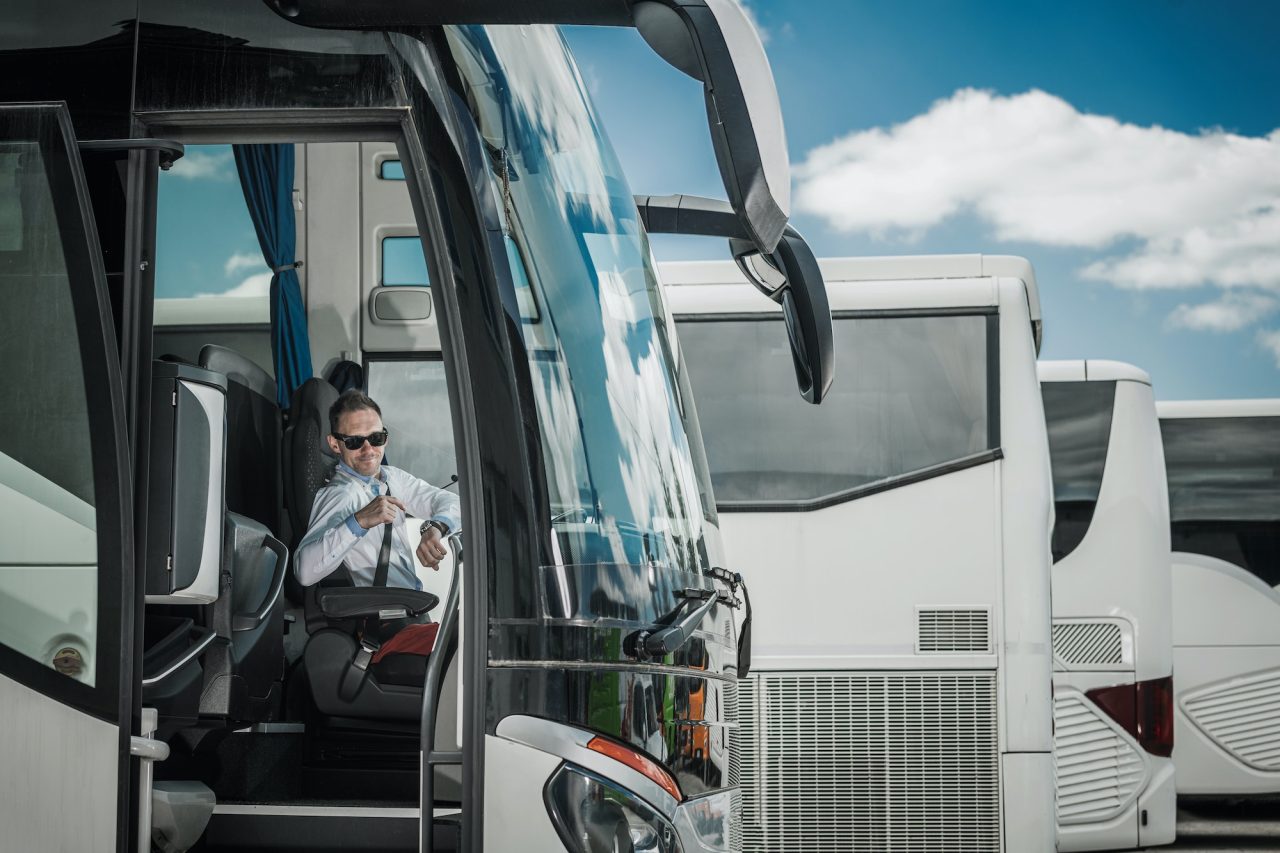 Bus Driver Pointing At Wrist Watch .jpg